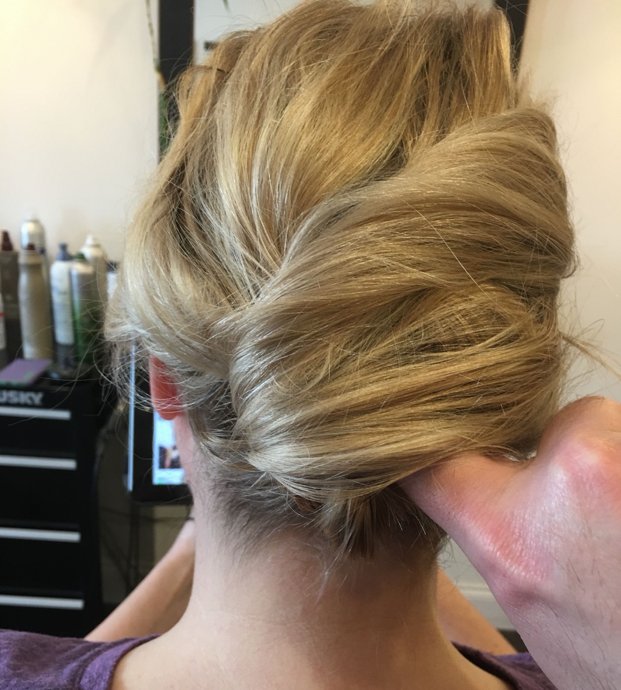Smooth French twist, pinned by hand