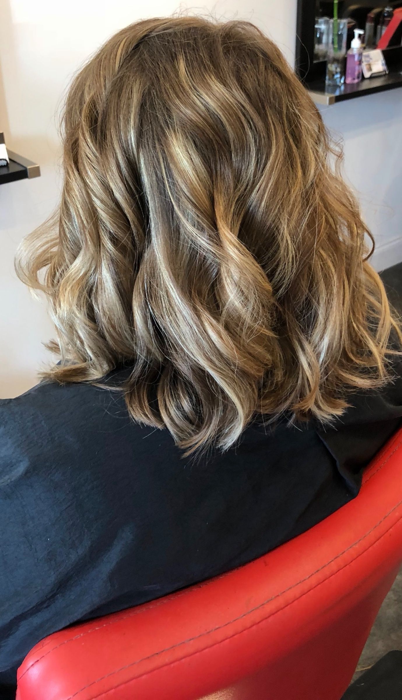 Soft, glossy waves with dimensional color